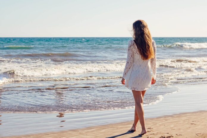 walking on beach Sithonia Greece